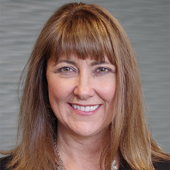 headshot of  Kristi Jovell, FAAC&reg;